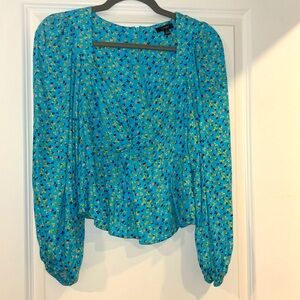 AFRM long sleeve top. Blue with small flowers all around.